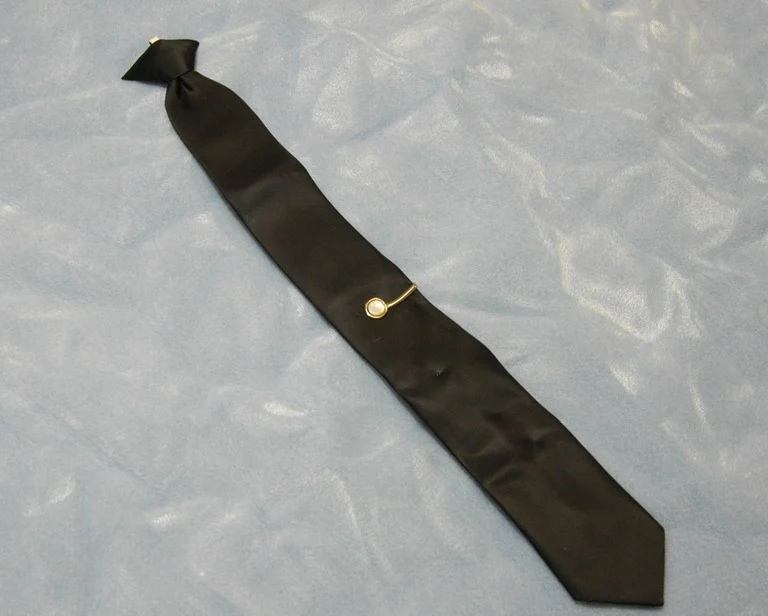 the tie and clip of db cooper left in the plane, the mystery of db cooper